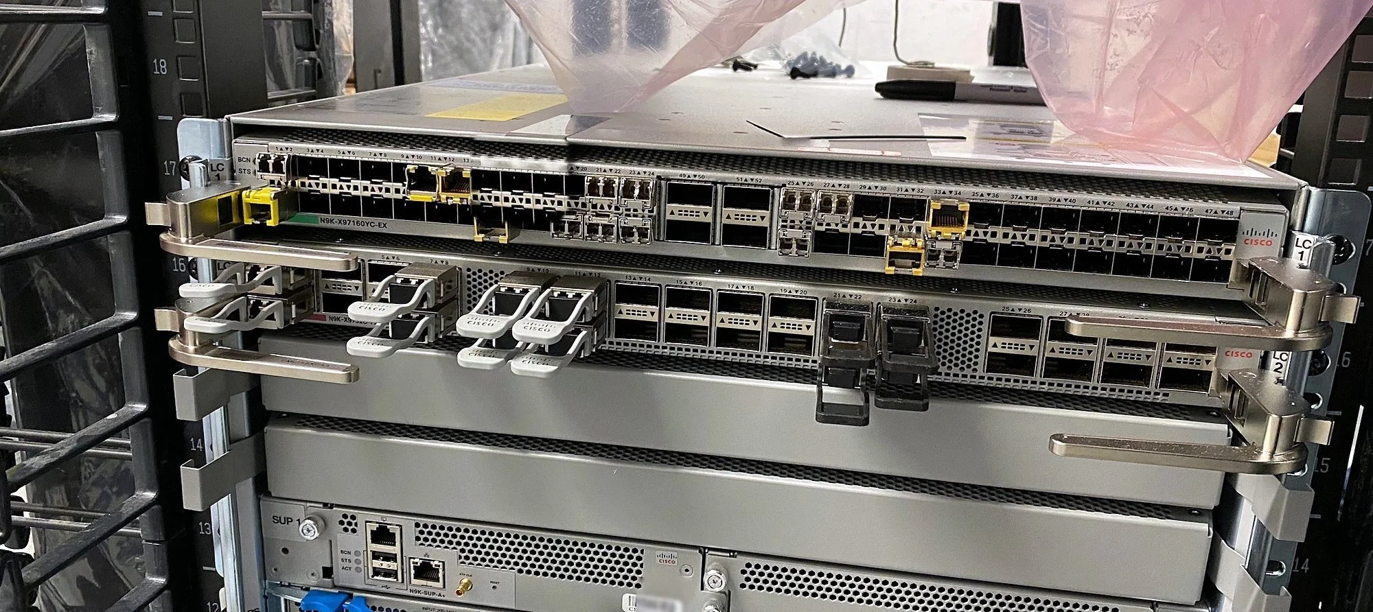 Cisco router chassis installed in a two-post rack