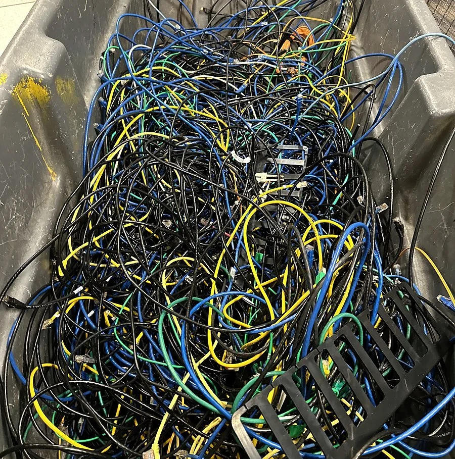 Bin of abandoned patch cables pulled during a data center cleanup