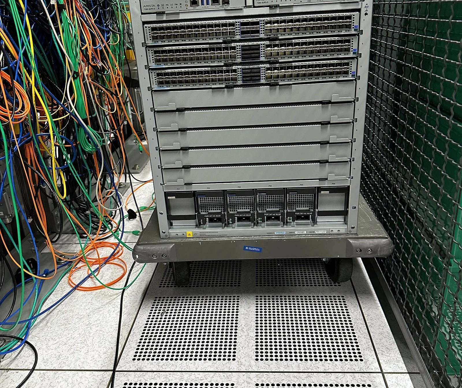 Modular chassis staged in a data center aisle