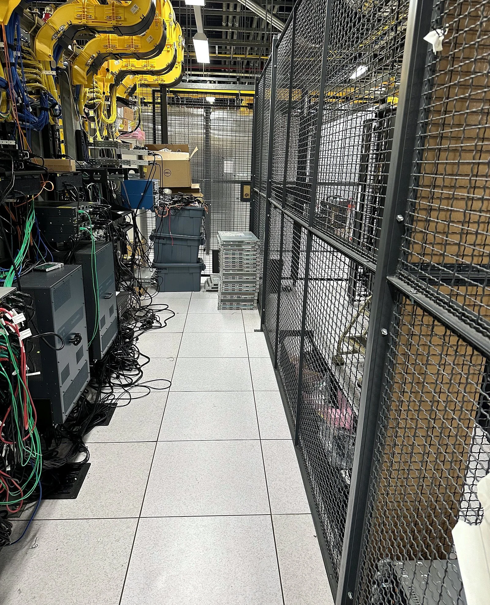 Colocation cage aisle in a data center