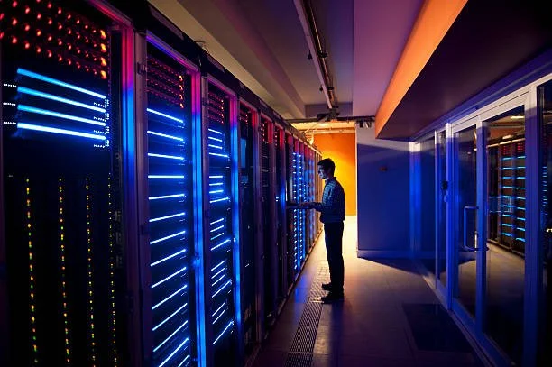 IT infrastructure services technician performing enterprise network switch installation in New York City data center