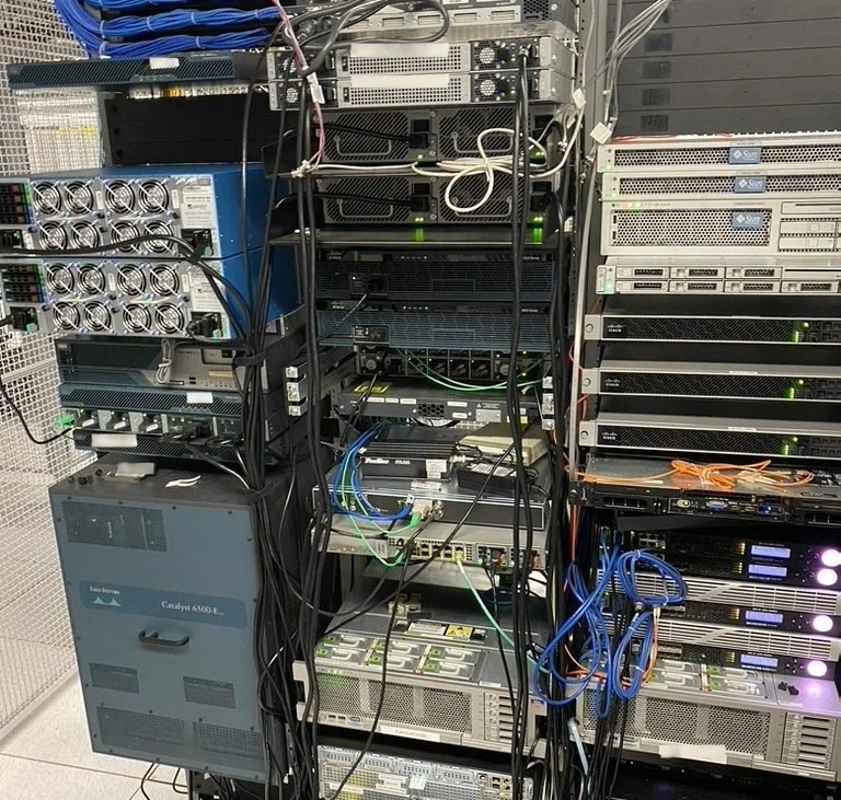 Mixed-vendor colocation rack with a Cisco Catalyst 6500, Cisco ASAs, Sun servers and routers