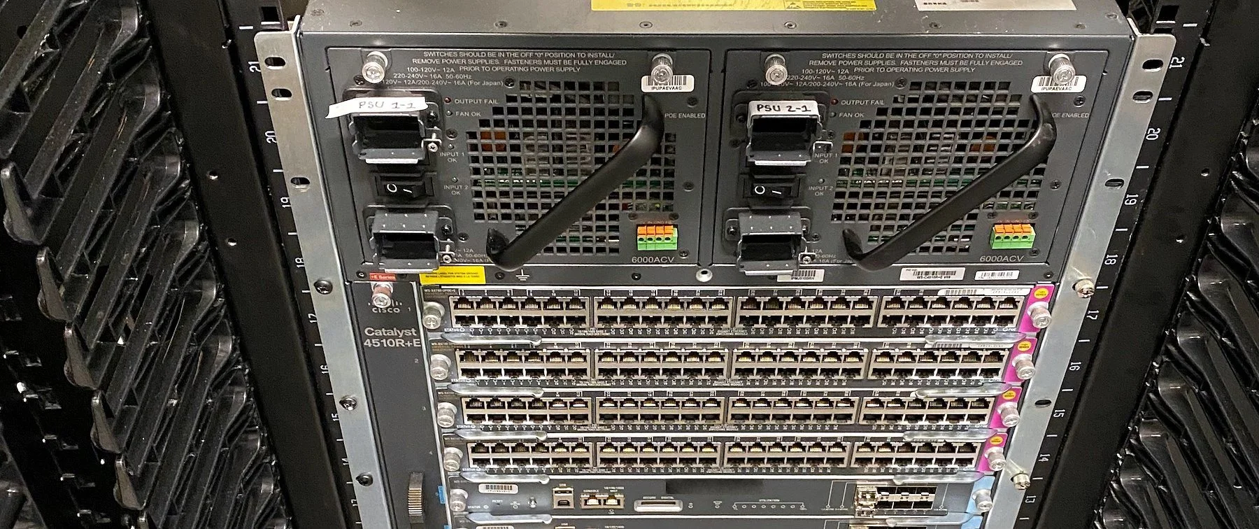Cisco modular chassis installed in a network cabinet