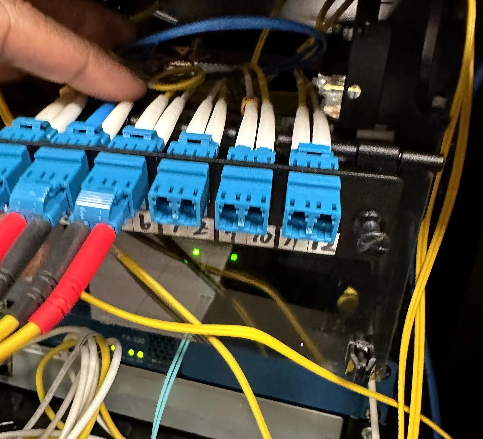 LC fiber connectors patched into blue fiber cassettes
