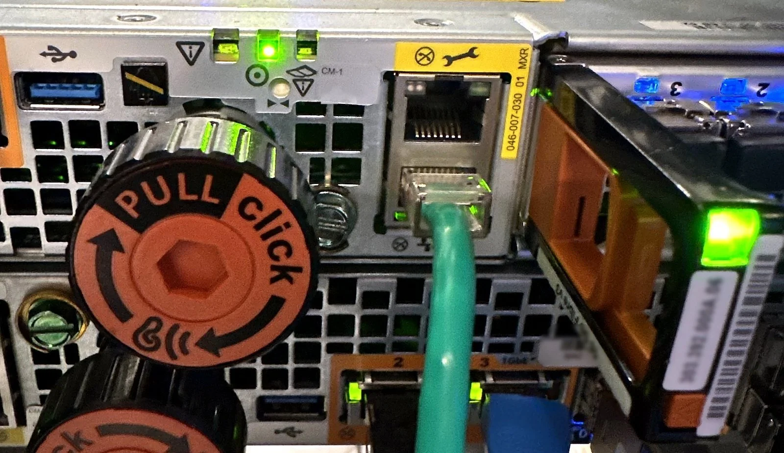 Rear of a storage system with cabling seated during a migration