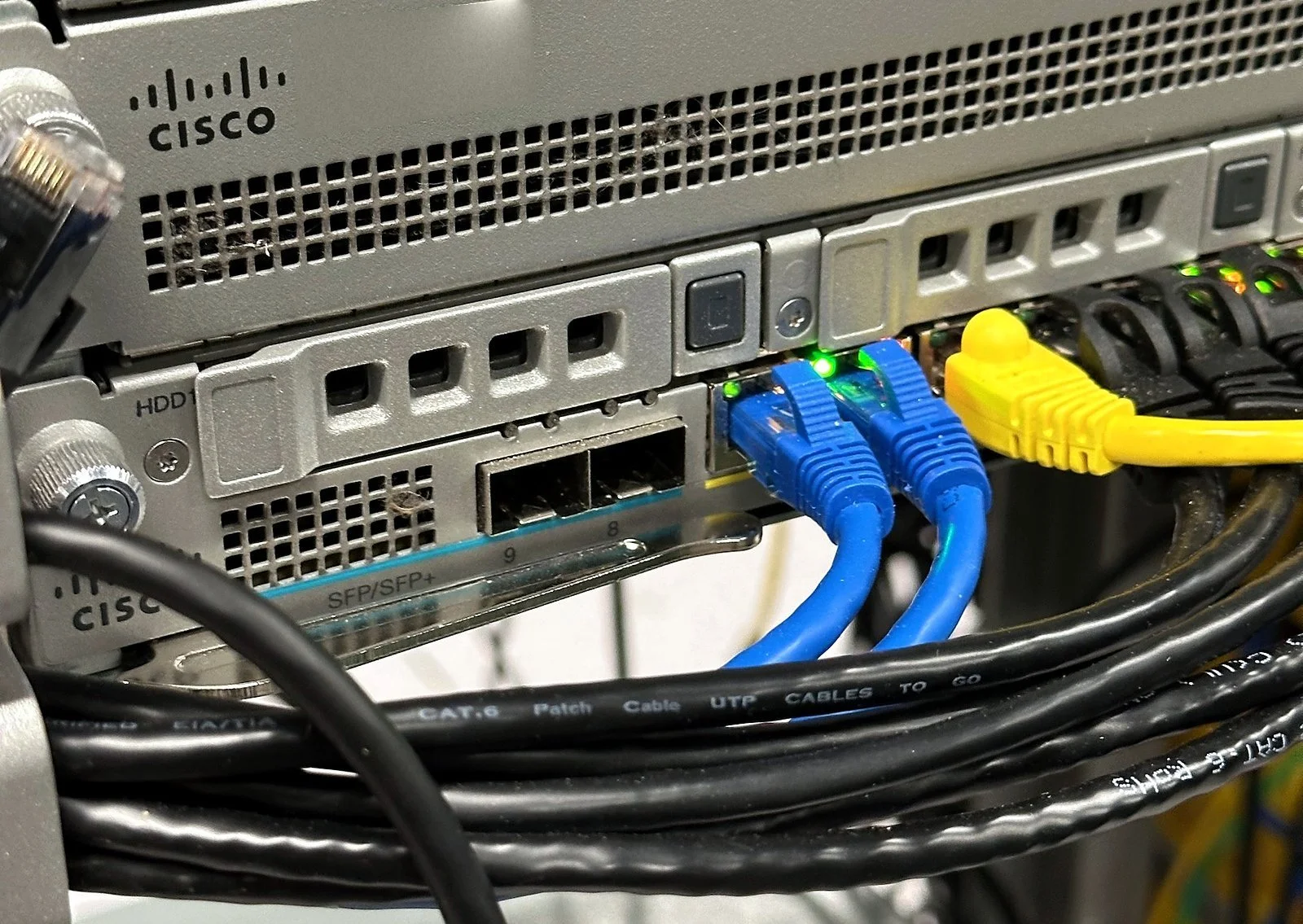 Switch ports patched with blue and yellow cables