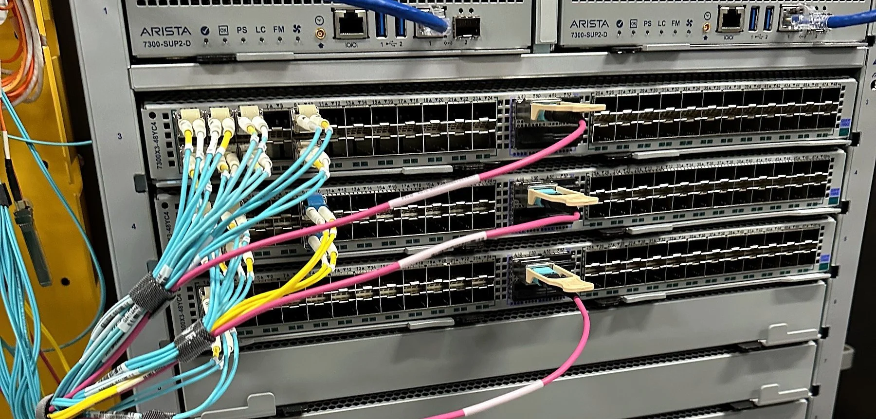 Modular switch chassis with multimode fiber patched to the line cards
