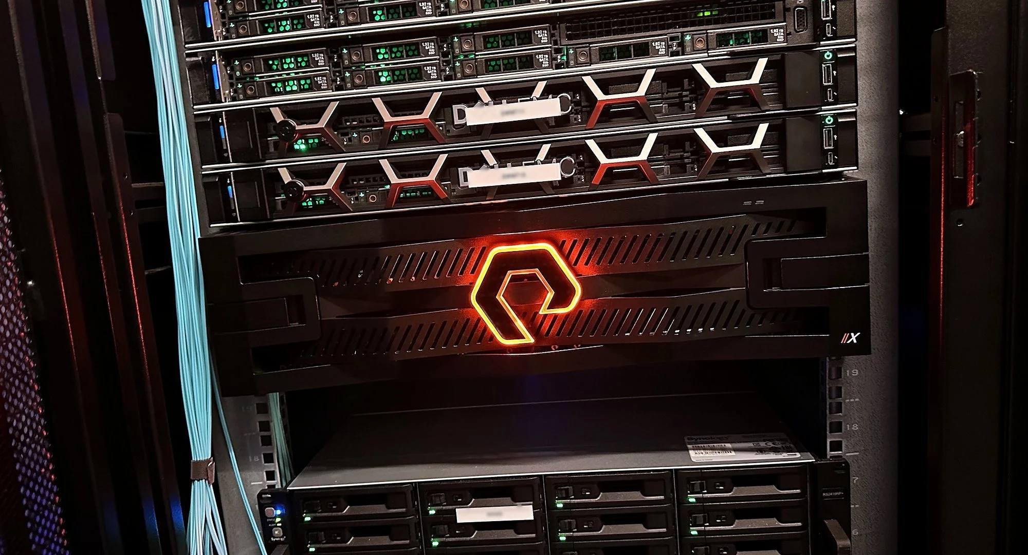 Pure Storage array lit up in a data center rack