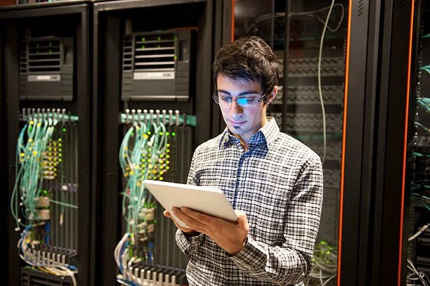 Core 1 IT Solutions field technician providing remote hands data center support in Manhattan NY colocation facility