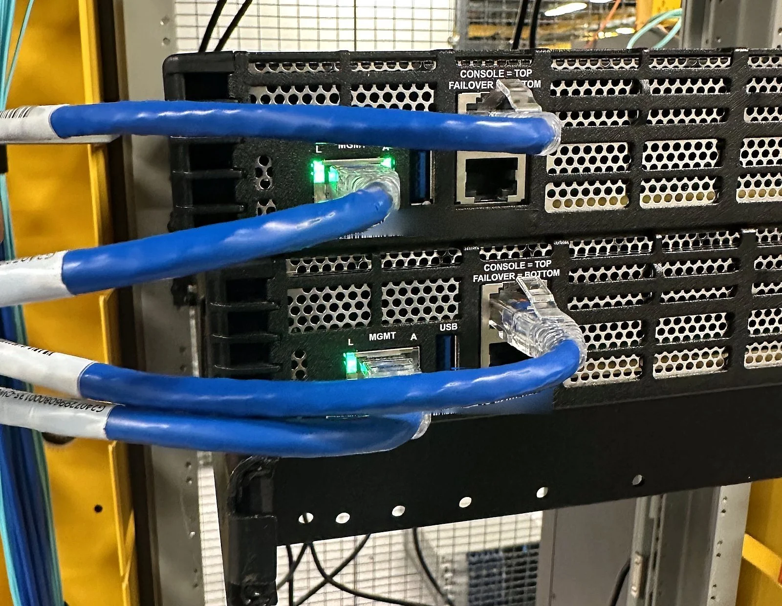 Patch cables routed to a switch in an open rack
