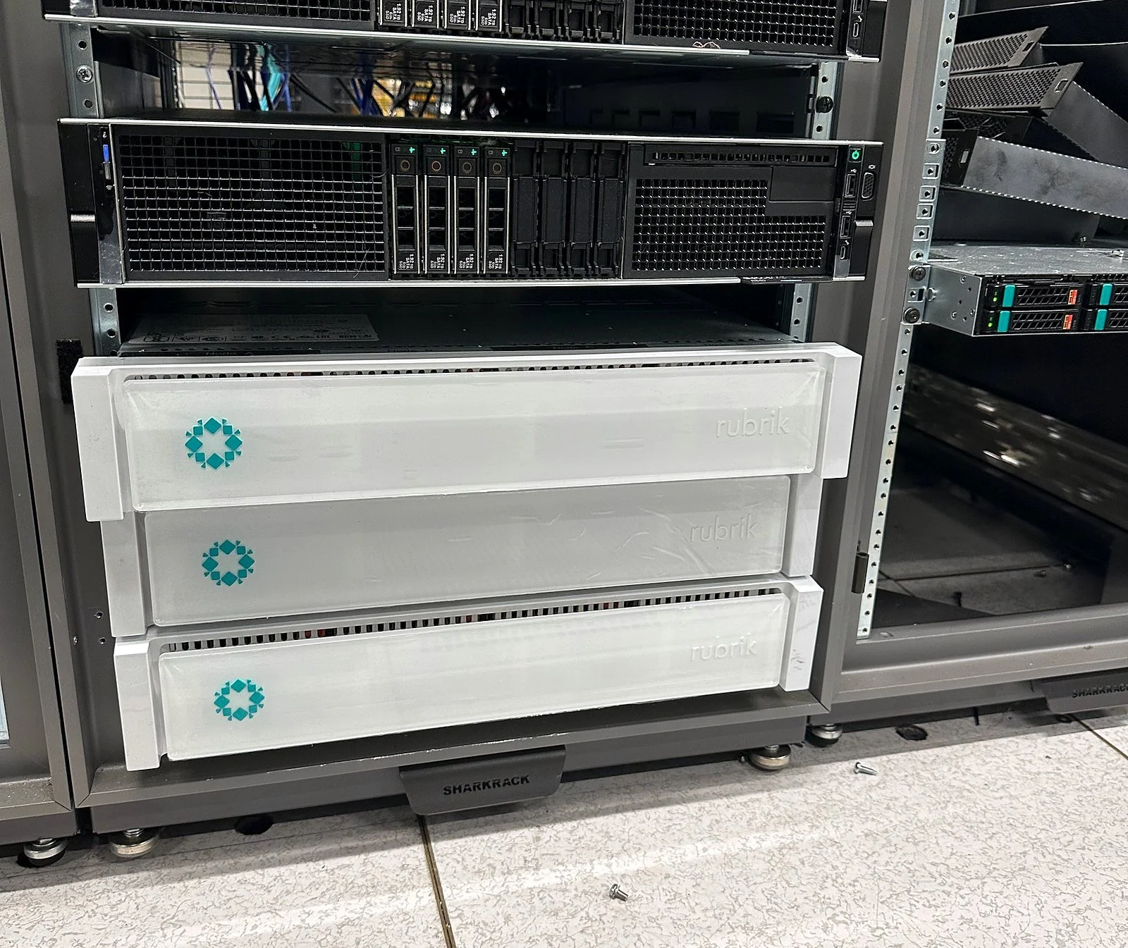 Rubrik backup appliances racked and powered in a data center cabinet