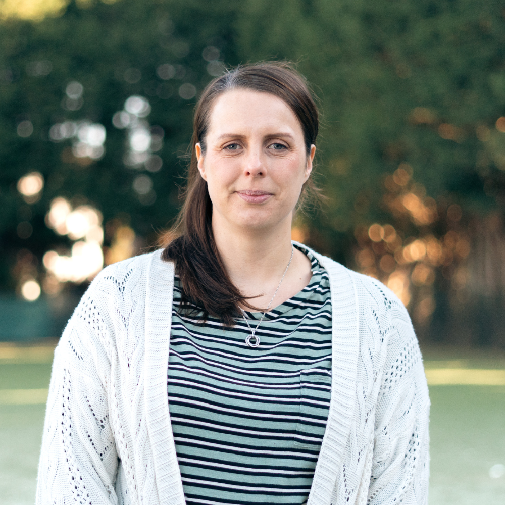 A pink background with the words 'Coming Soon' repeated multiple times in different shades of pink and white.