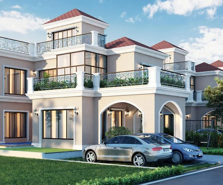 Modern multi-story house with balconies, large windows, and a red-tiled roof. Two cars parked in front, surrounded by green lawn.