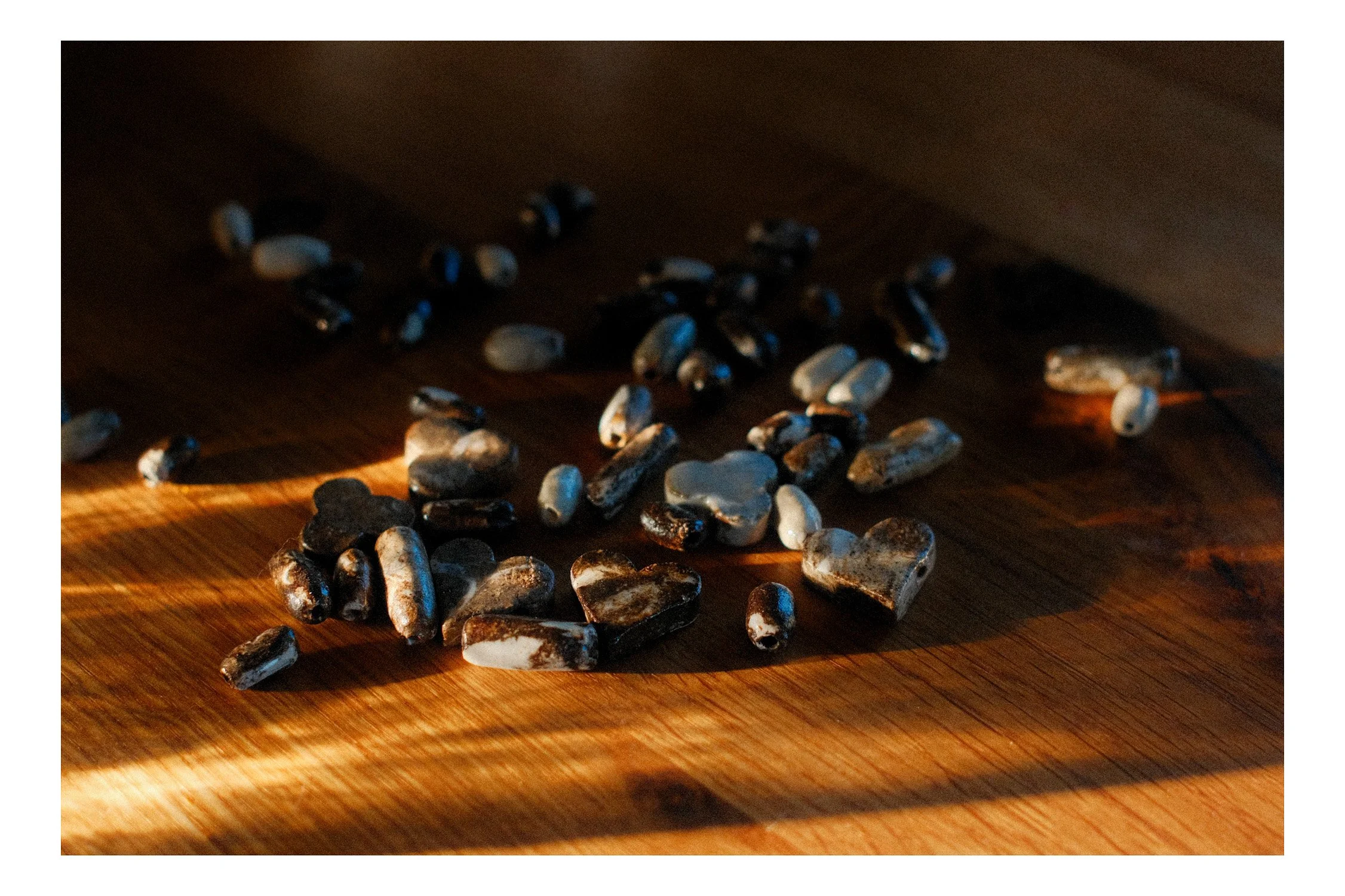 An image of hand made ceramic beads.
