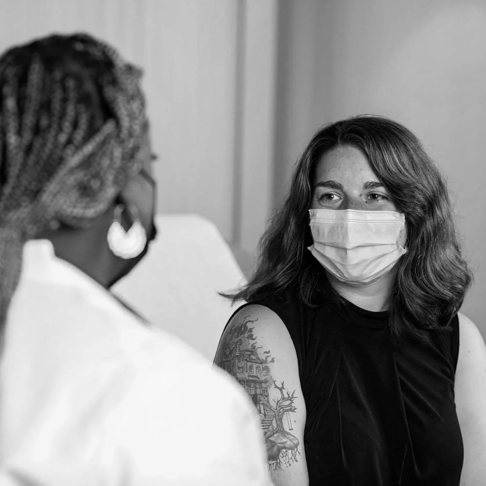 Geometric drawing of an outline square with sections divided by vertical, horizontal, and circle lines.