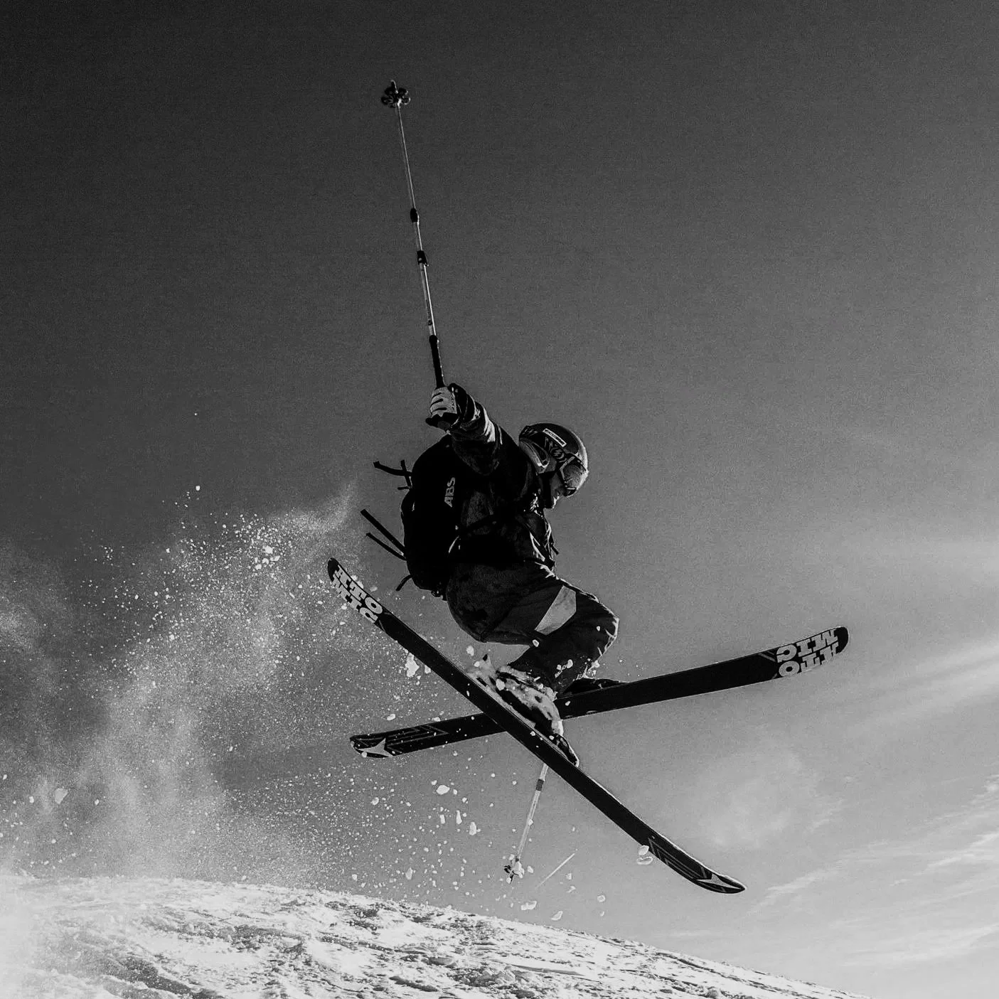 Geometric drawing of an outline square with sections divided by vertical, horizontal, and half circle lines.