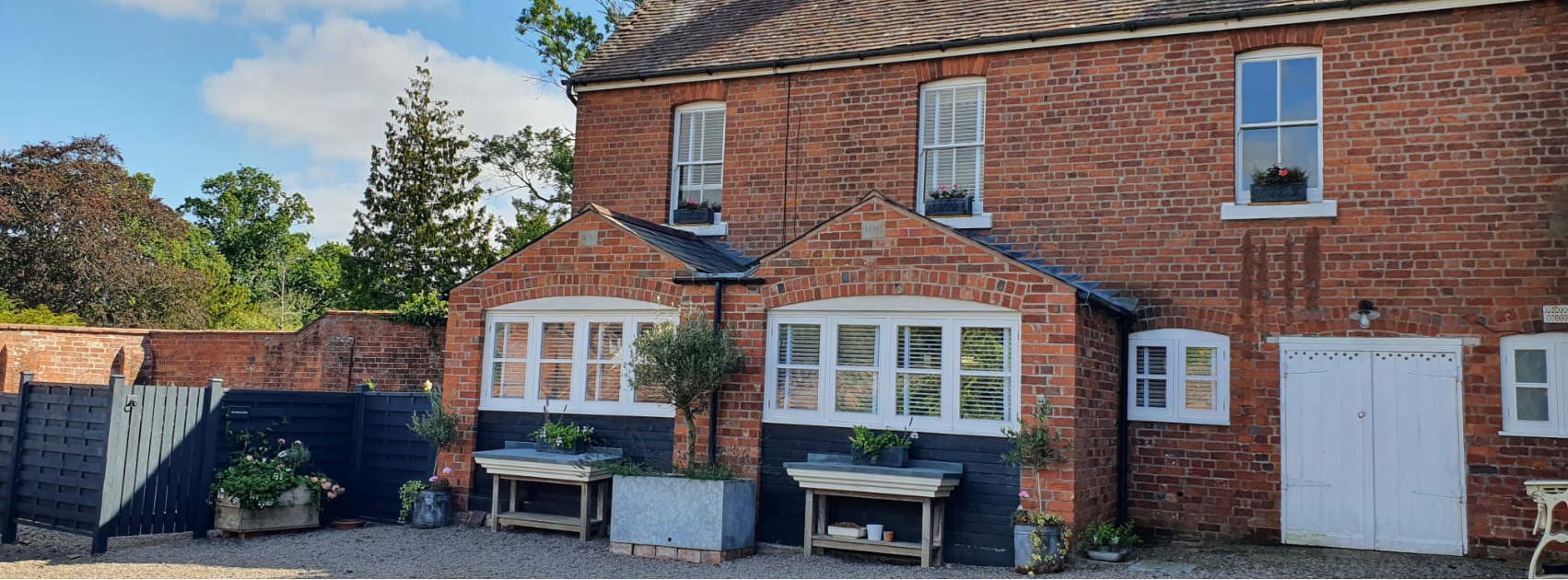 Exterior of a brick built period coach house