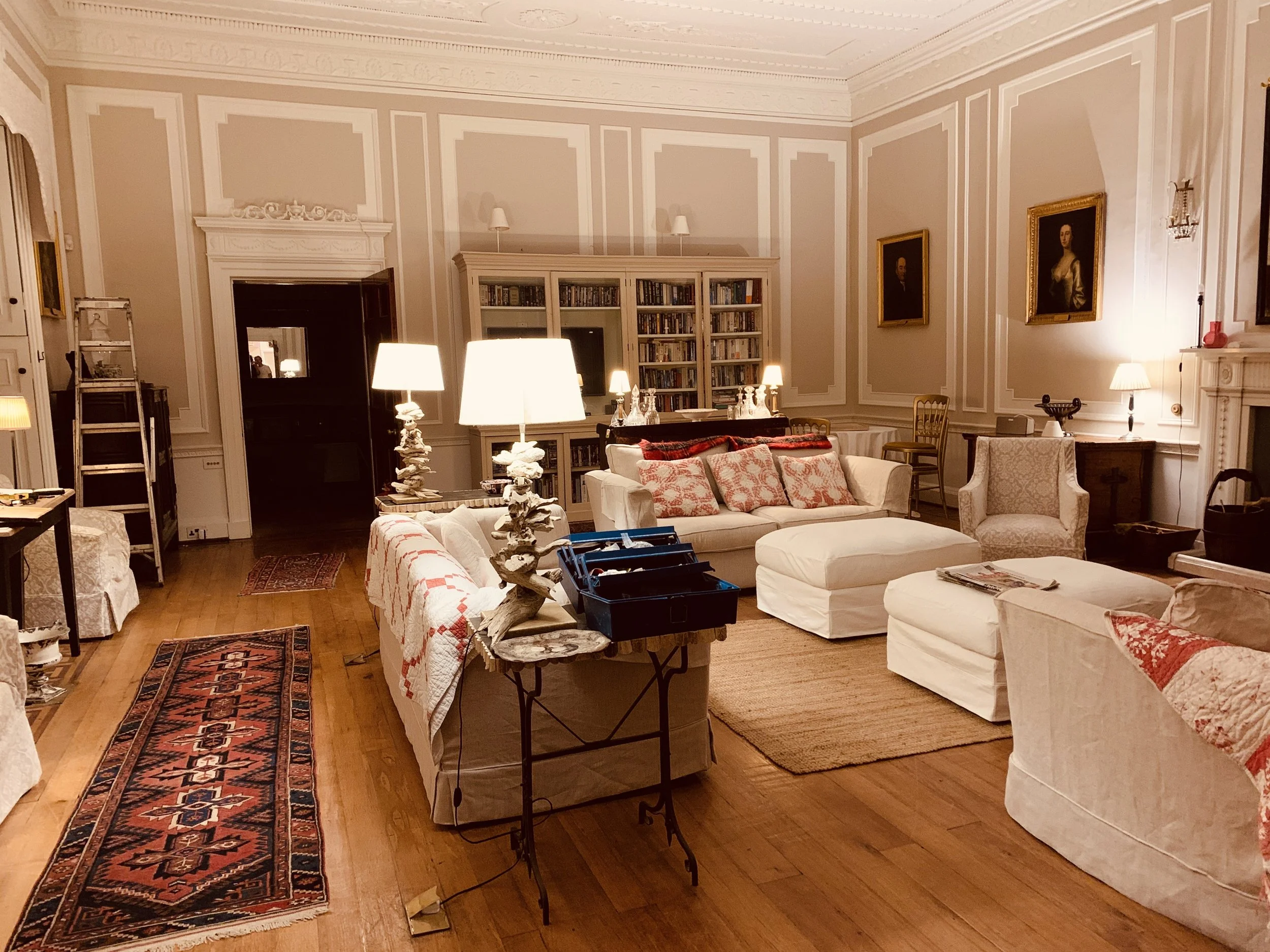 Evening conversations continue in the drawing room at Barton Court