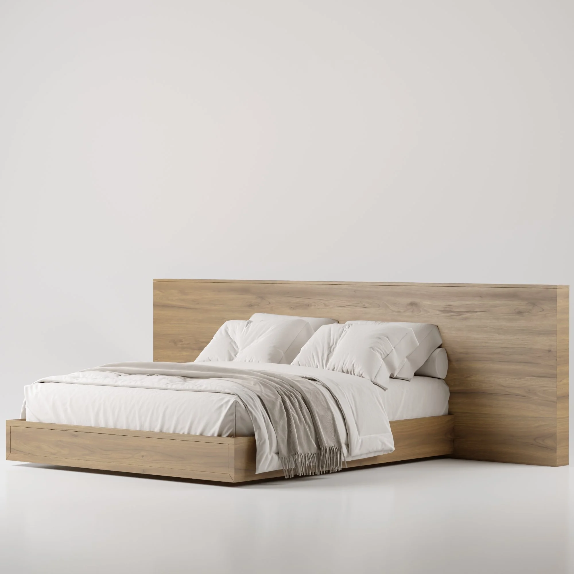 Cama de madeira com roupa branca e travesseiros em um fundo de parede branca