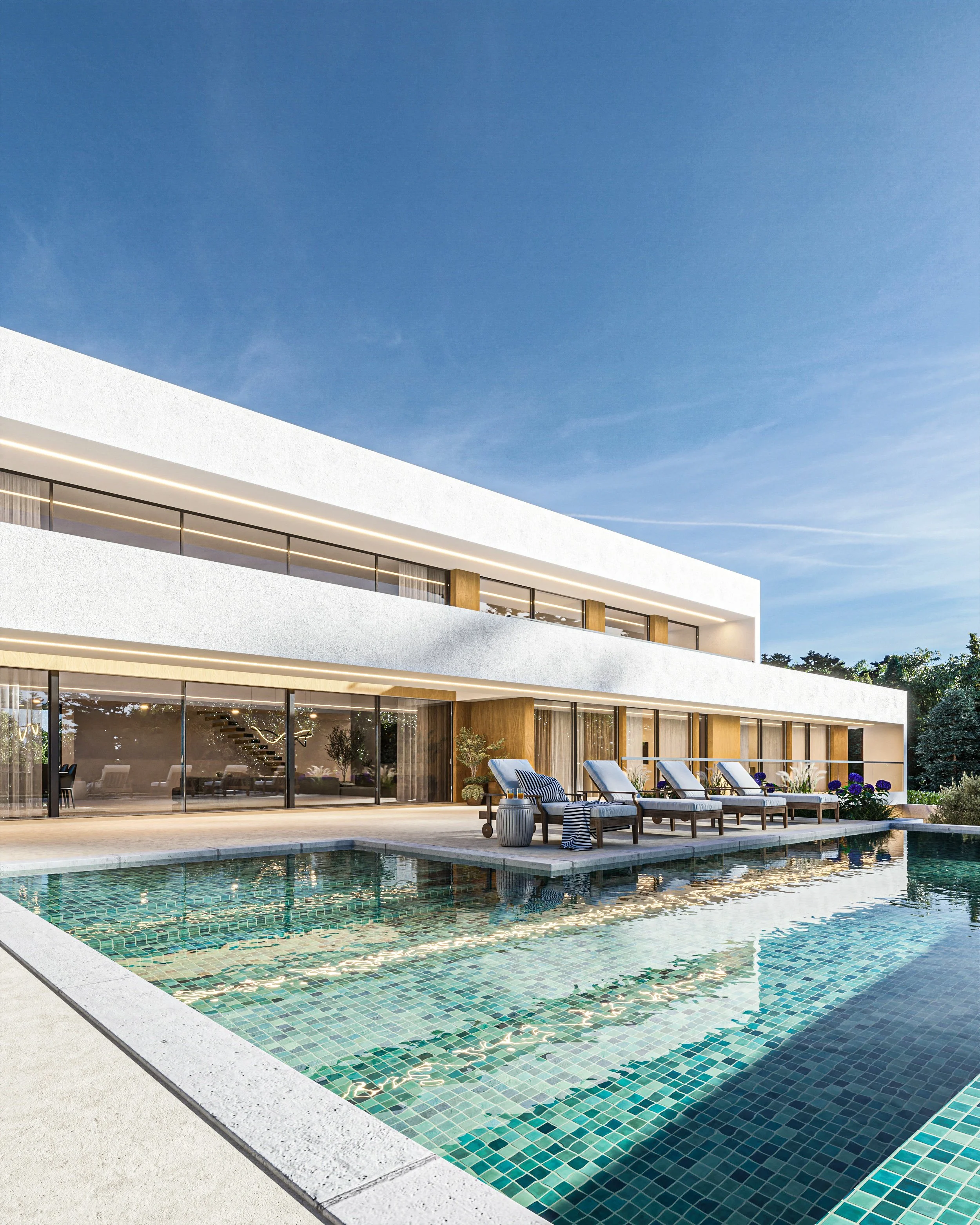 Residência moderna com piscina, espreguiçadeiras e área de estar ao ar livre sob céu claro.
