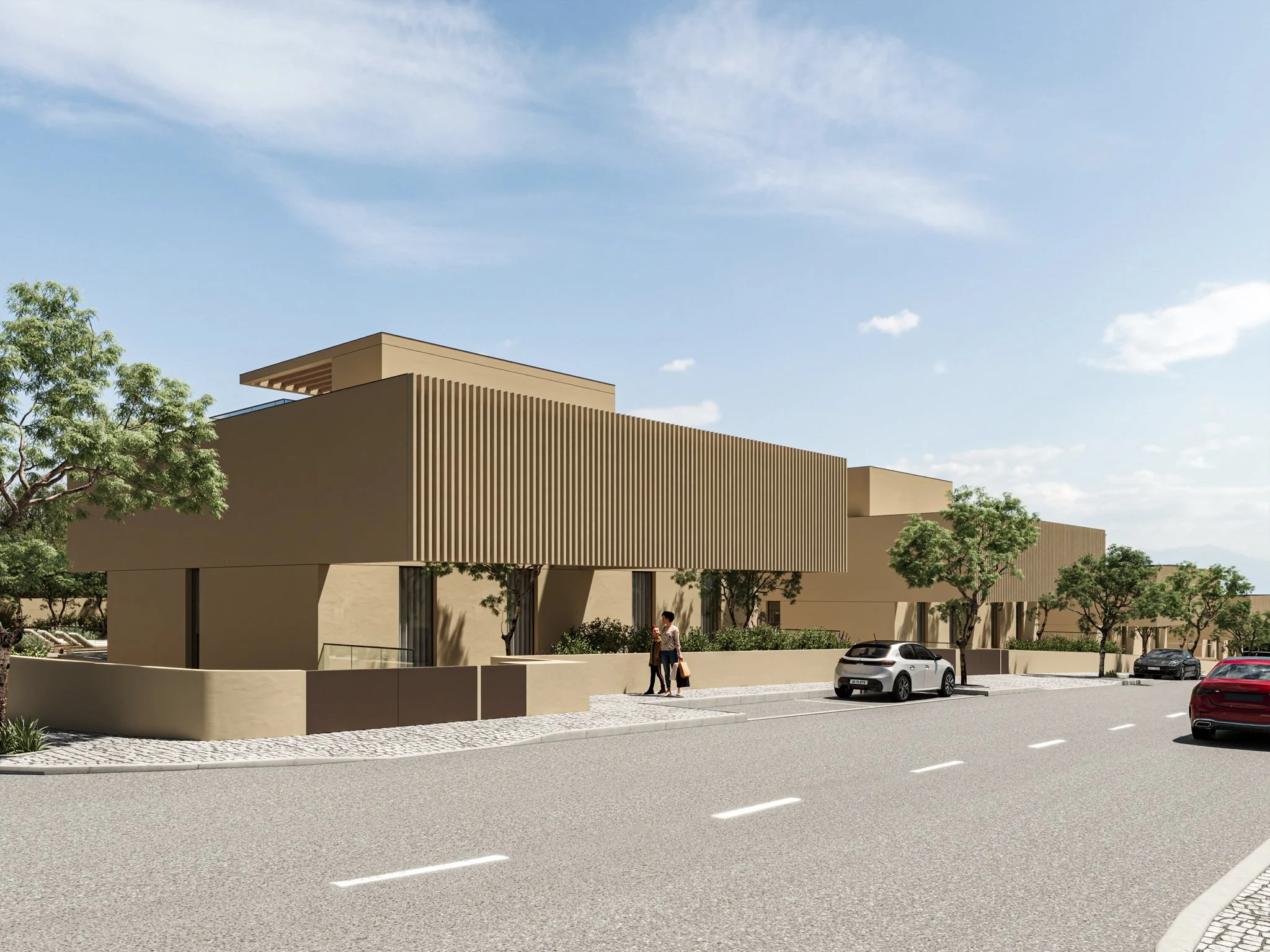 Edifício moderno com aparência minimalista, cercado por árvores, na porta de uma rua com carros estacionados e uma pessoa caminhando na calçada, sob céu claro com poucas nuvens.