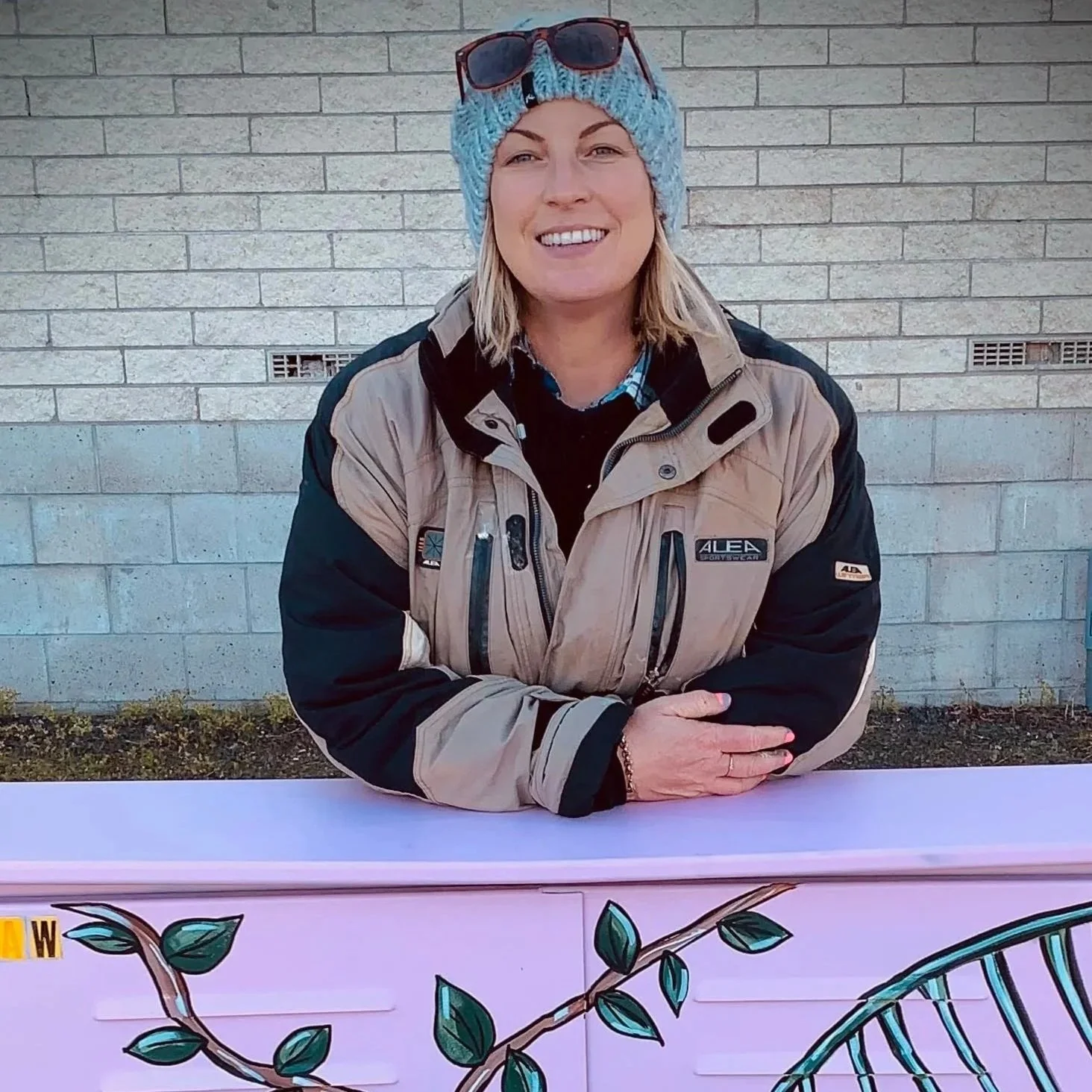 Dannika Tukua with a painted Chorus cabinet in Te Awamutu