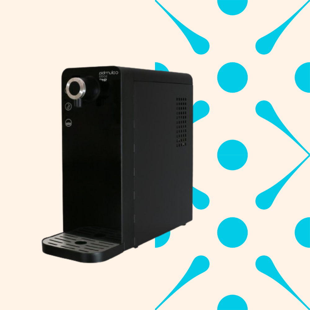 A black soda machine with a silver nozzle on top and a drip tray at the bottom, against a beige background with blue abstract shapes.