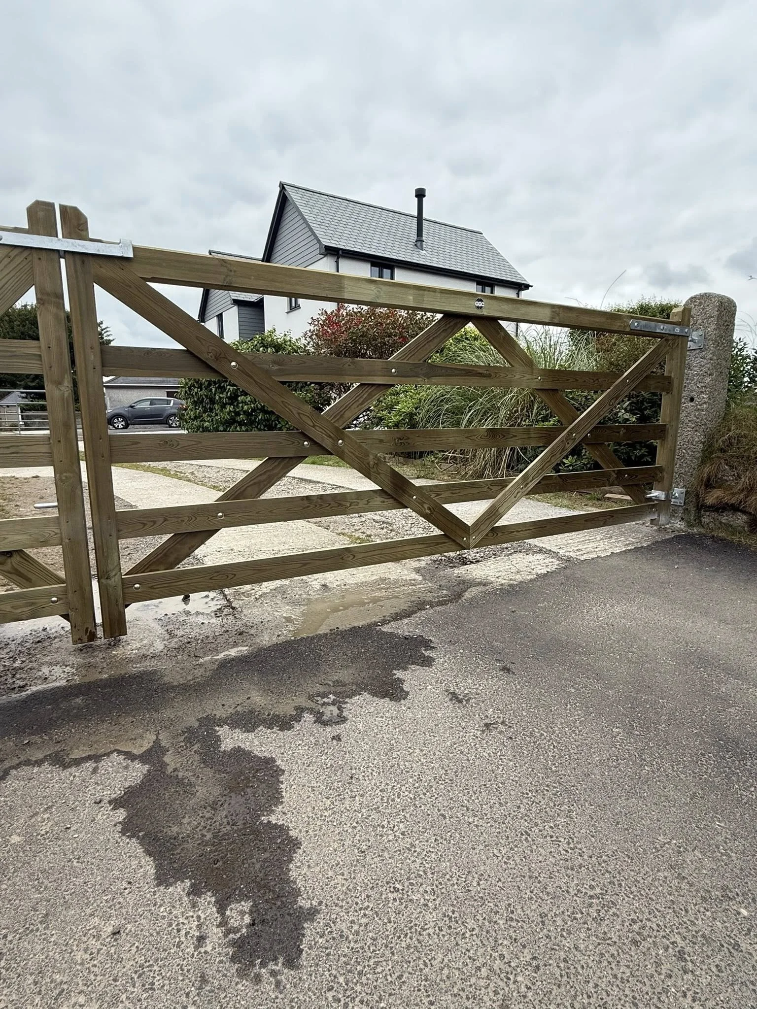 Classic timber five-bar field or driveway gate, traditionally crafted for Cornish country properties.
