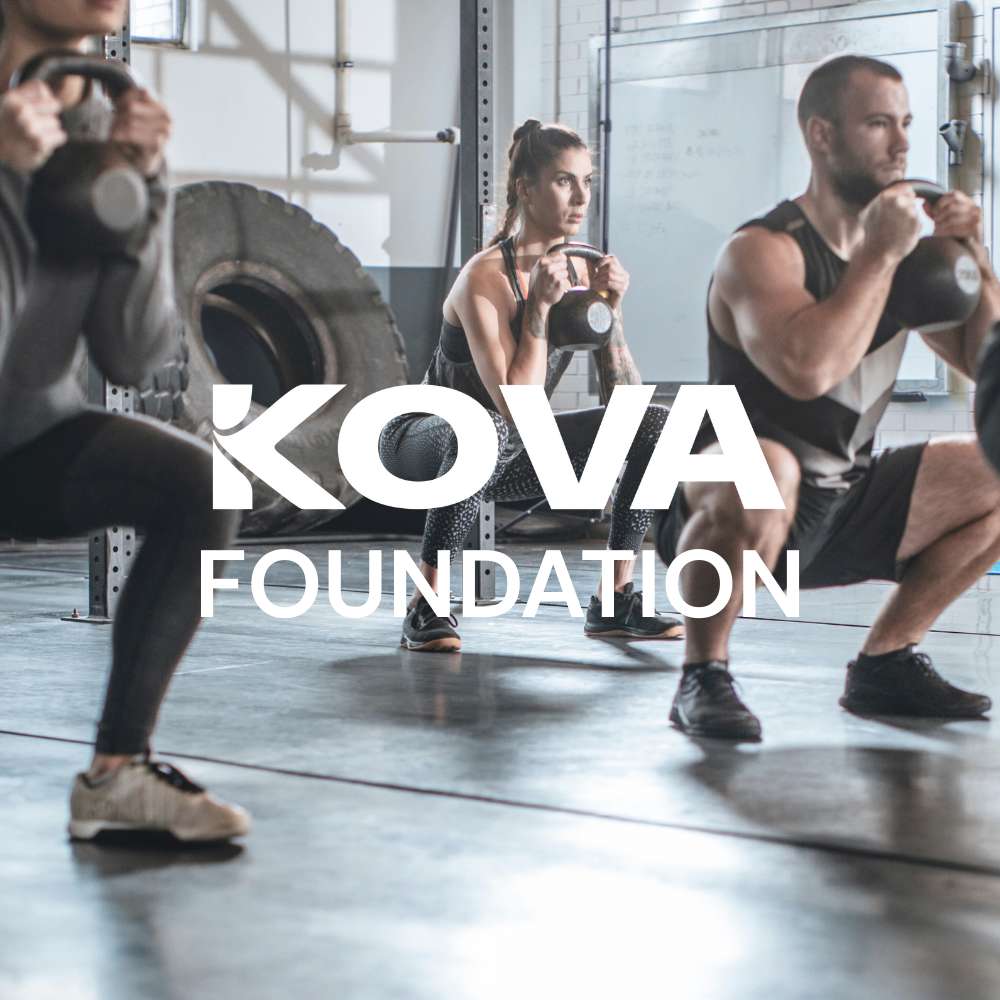 People doing squats with kettlebells in a gym, with the words 'KOVA FOUNDATION' overlaid.