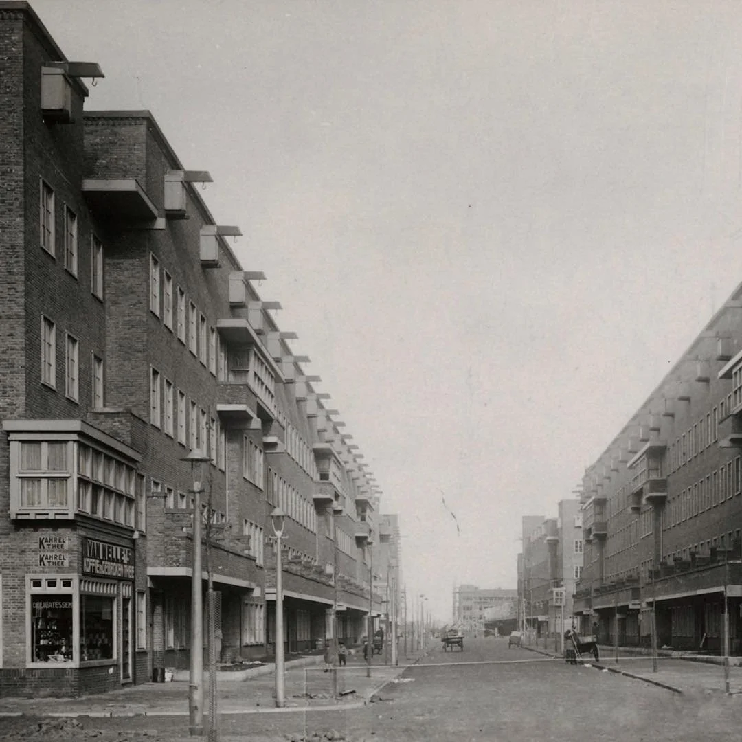 1937 &amp; Now: in this post you see Orteliusstraat, looking in the direcrtion of Jan Evertsentraat. The street in the foureground is Van Spilbergenstraat. At the time this 'then' photo was taken, the corner building at Orteliusstraat 153 was home to