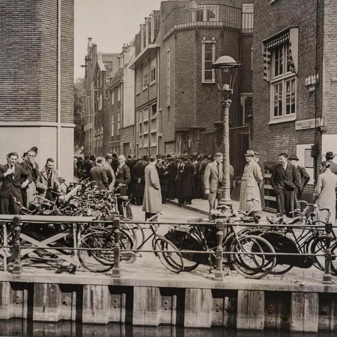 1940 &amp; Now: today's post was taken during WWII, when Amsterdam was occupied by Nazi Germany. During the war, Dutch men were forced to work in Germany, in many cases in the war industry. Before leaving for their employment abroad they had to under