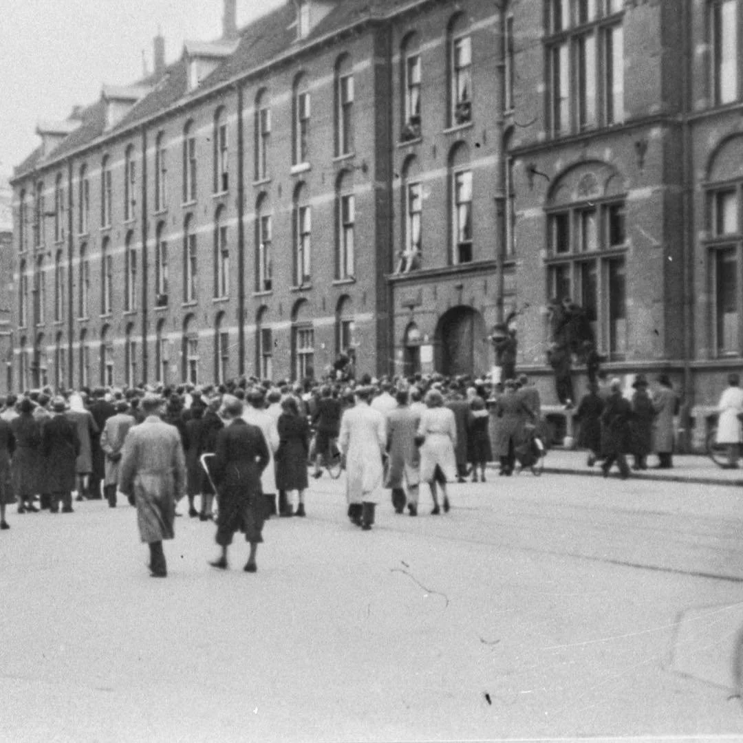 1945 &amp; Now: this photo was taken at the end of WWII, on 6 May 1945 to be precise. Following the liberation of Amsterdam, political prisoners who were held in the detention center at the Kleine-Gartmanplantsoen were released. Groups of people gath