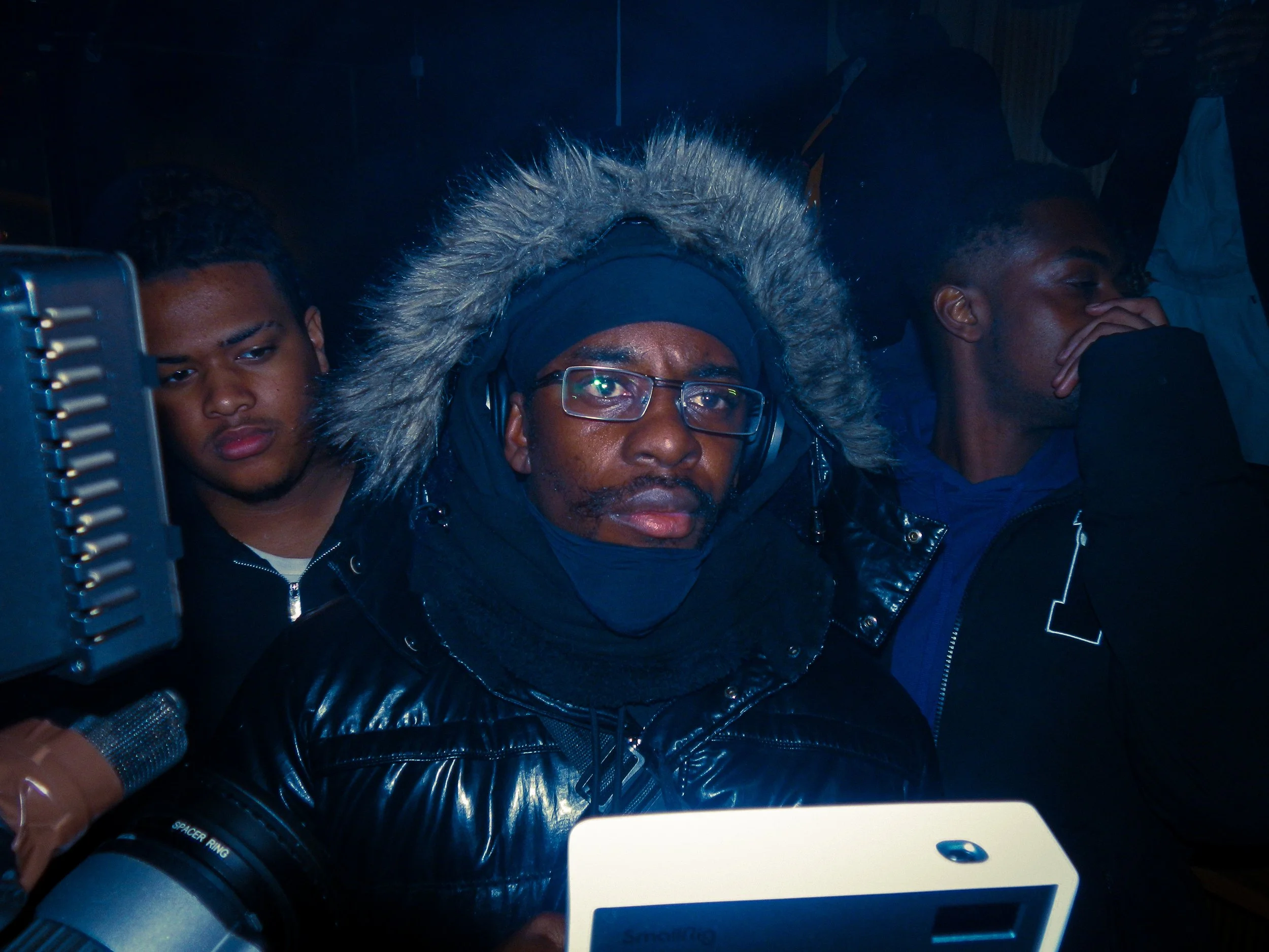 Logan olm at travspresents grime rave in the middle of a crowd with camcorders in his face