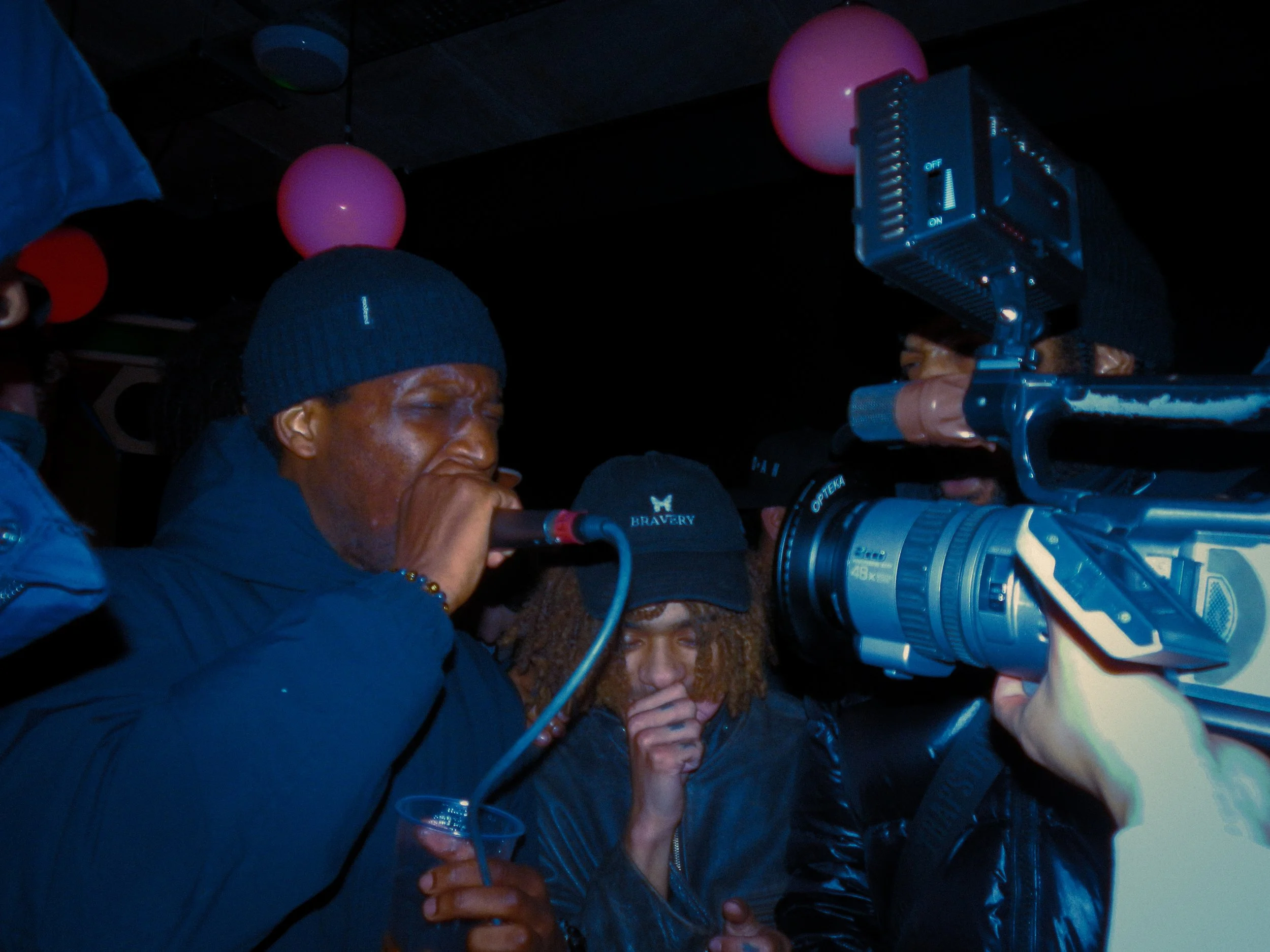 grime musician elf performing into mic and camera at travspresents grime rave London 