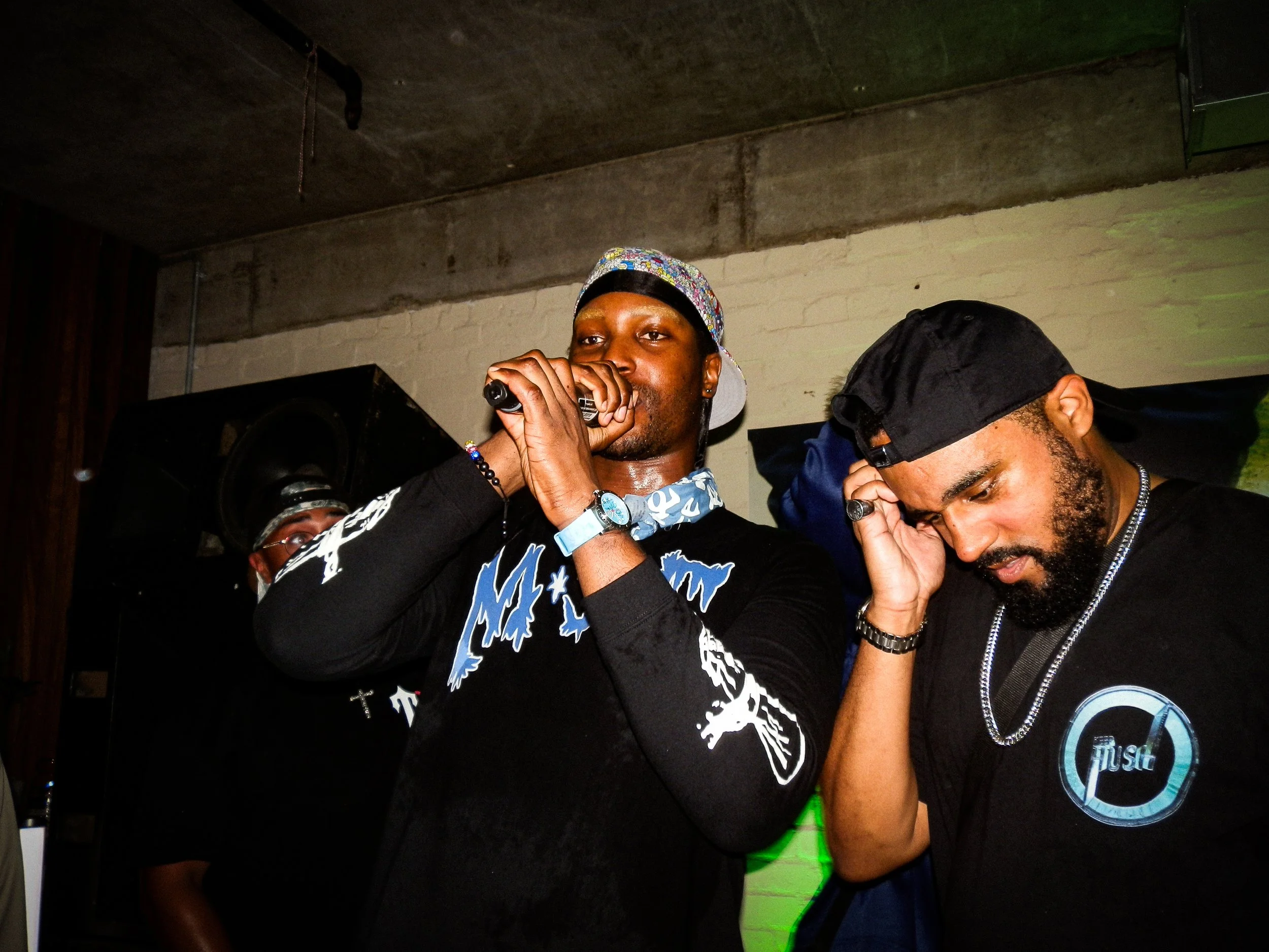 M.I.C and Jammz on stage at grime book launch