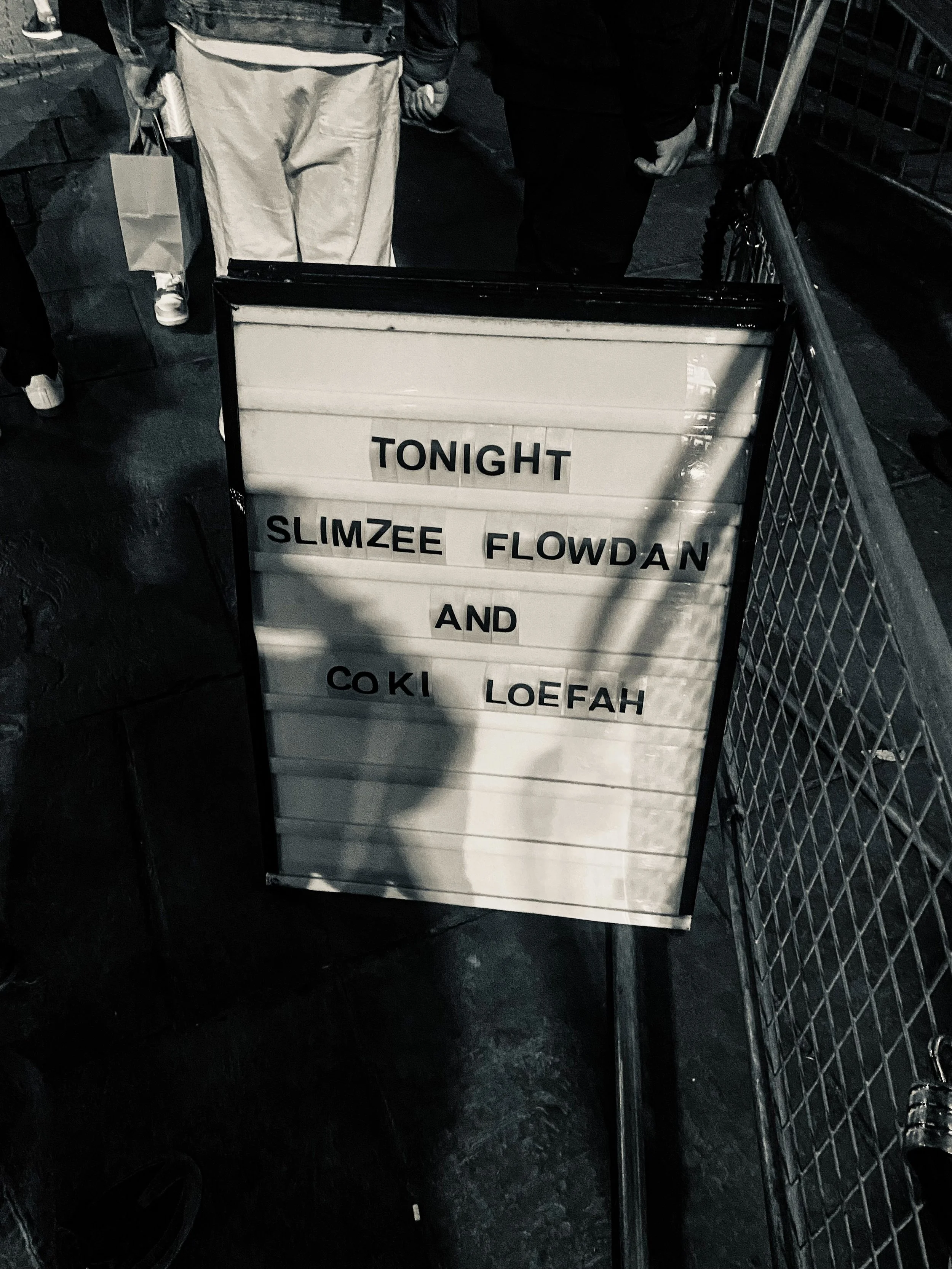 Event pavement sign saying 'tonight Slimzee and Flowdan and Coki Loefah' outside of Jazz Cafe in Camden 