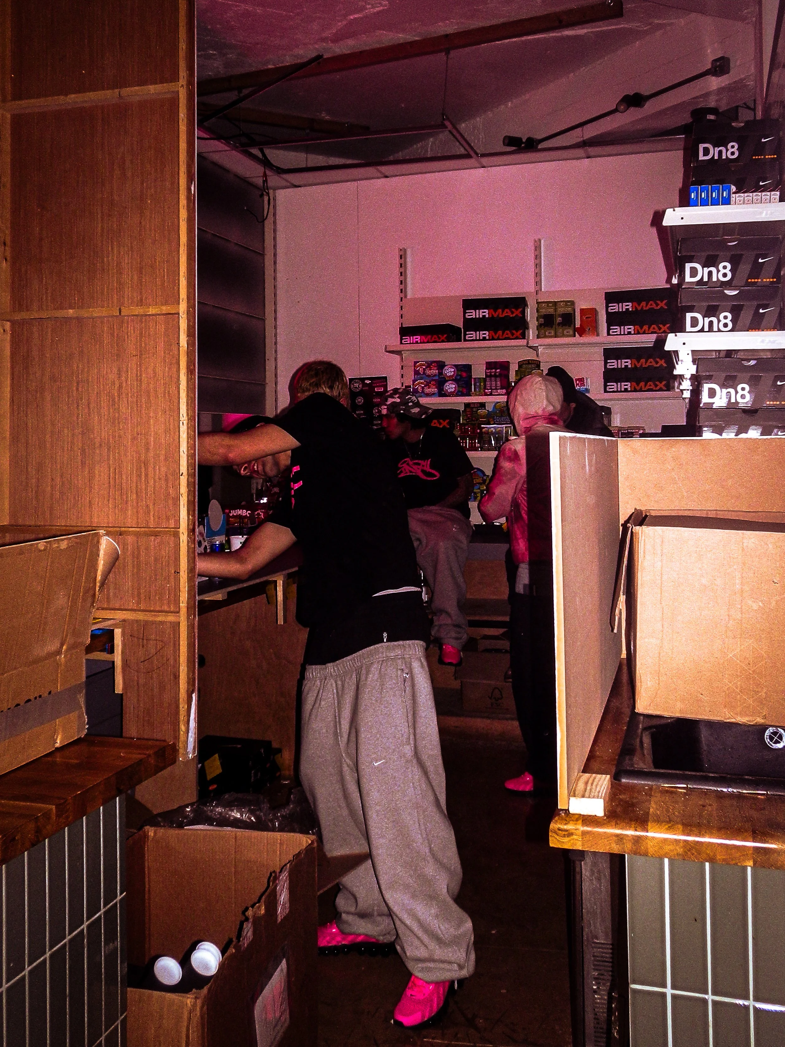 behind the scenes photo of staff stocking the Pastdown vintage x Nike pop up shop