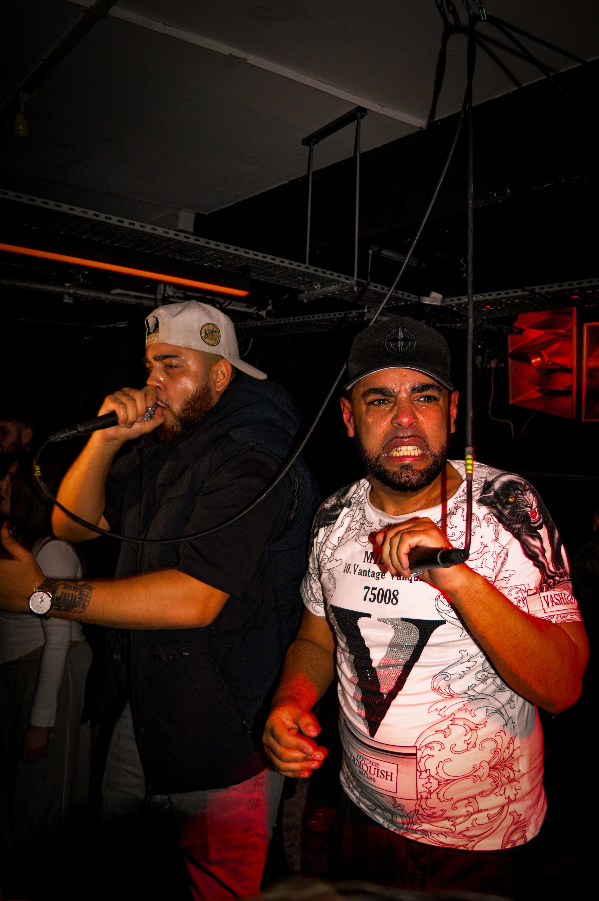 mc performing in the middle of wheel up grime rave 