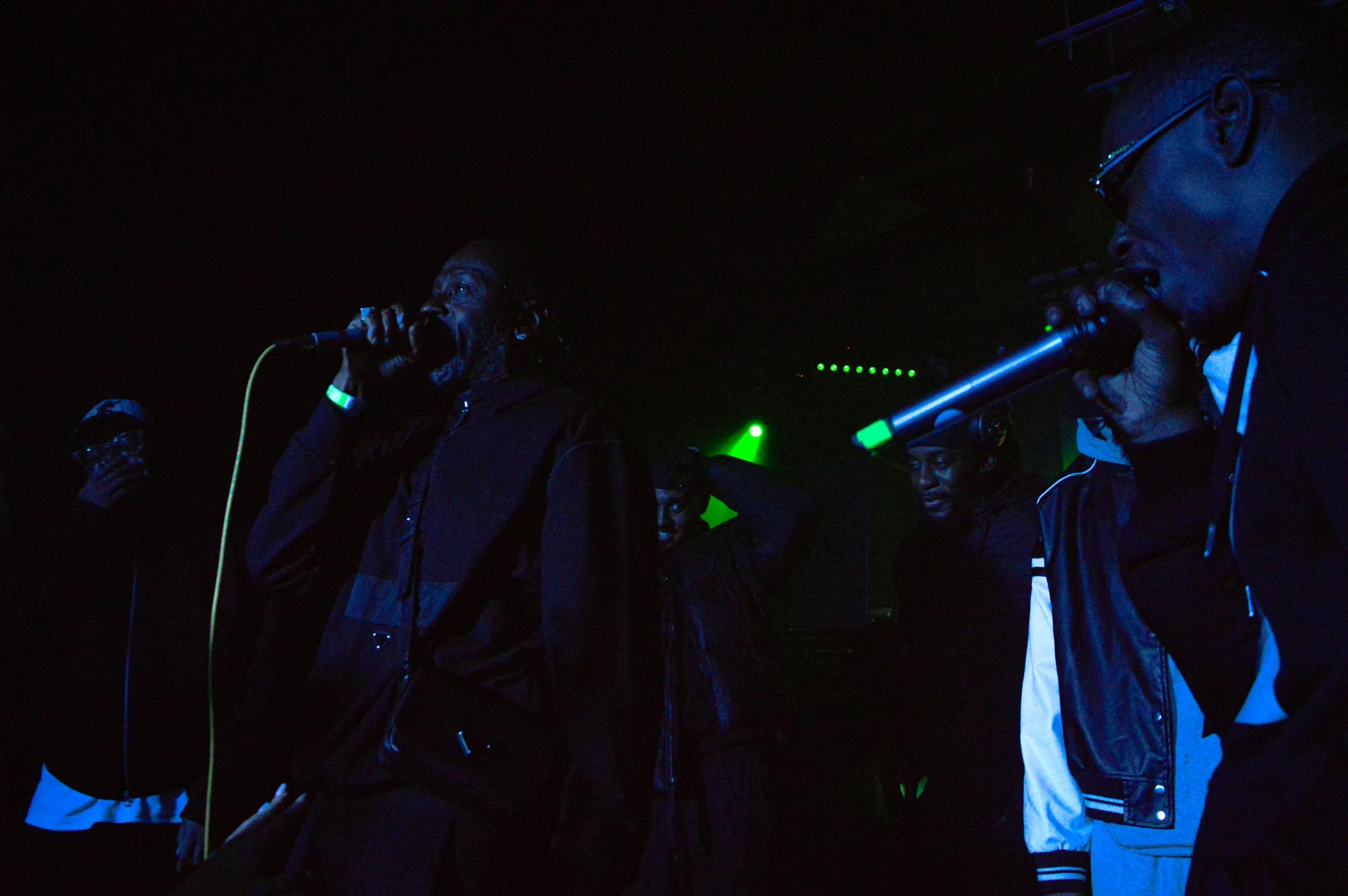 manga st Hilaire, flowdan, logan olm, and killa p mcing on stage at a grime rave