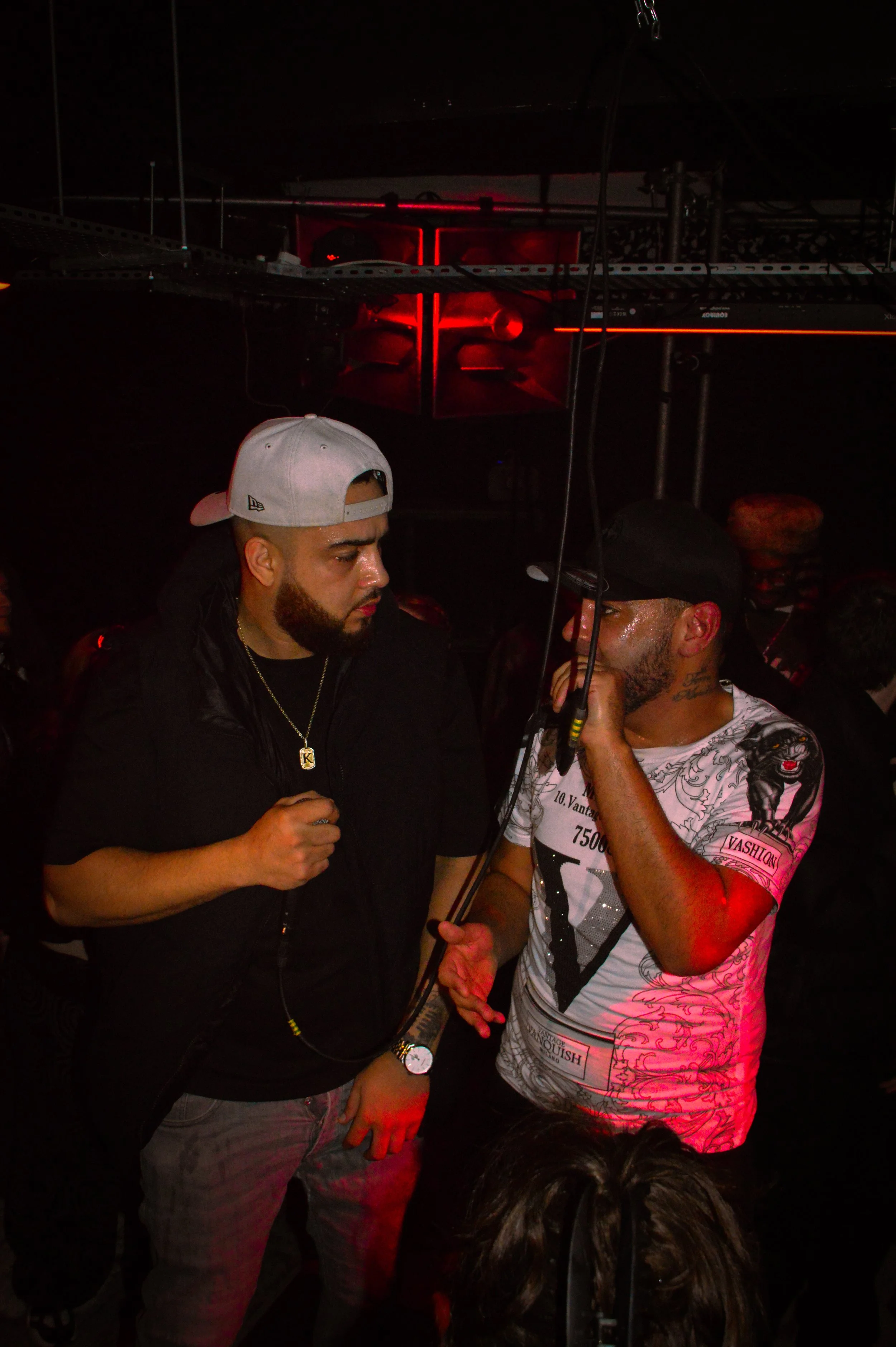 mc performing in the middle of wheel up grime rave 