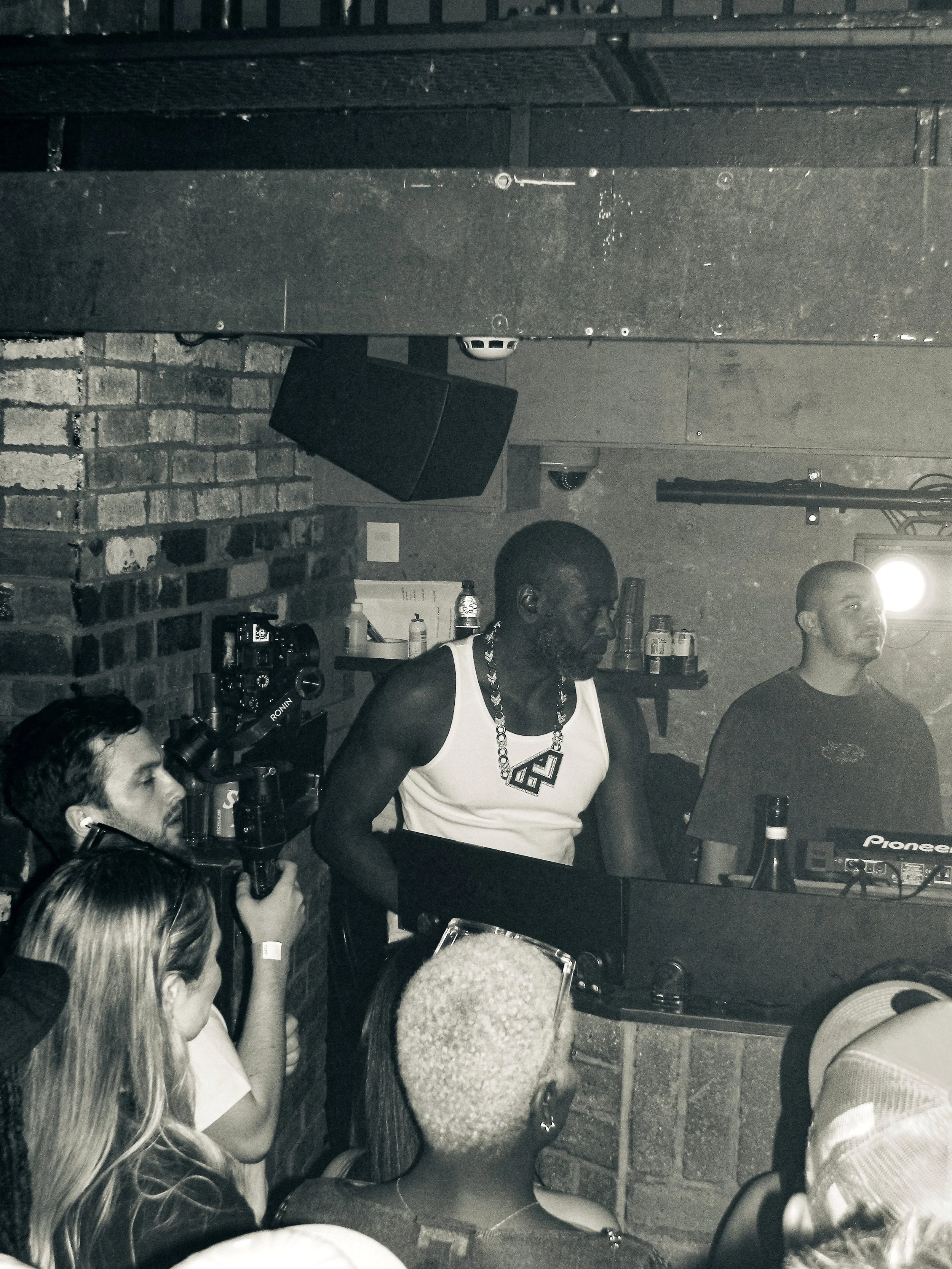 flowdan behind decks on stage at jazz cafe