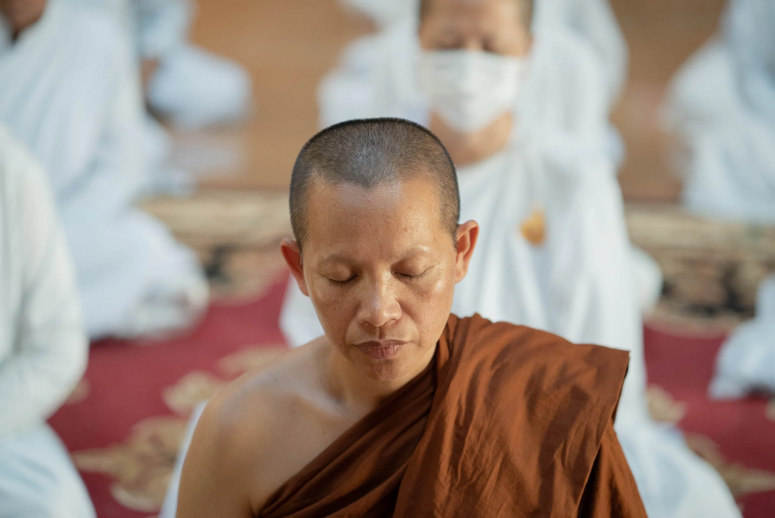 Bikkhuni Ayya Jutindhara meditating with nuns eyes closed in cambodia