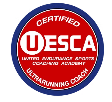 USCA Certified Ultramarunning Coach logo with red, white, and blue colors and text for United Endurance Sports Coaching Academy.