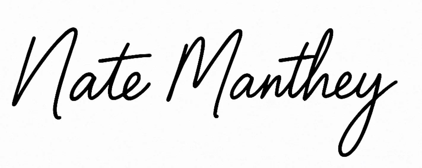 Signature of the name 'Nate Manthey' in black cursive on a white background