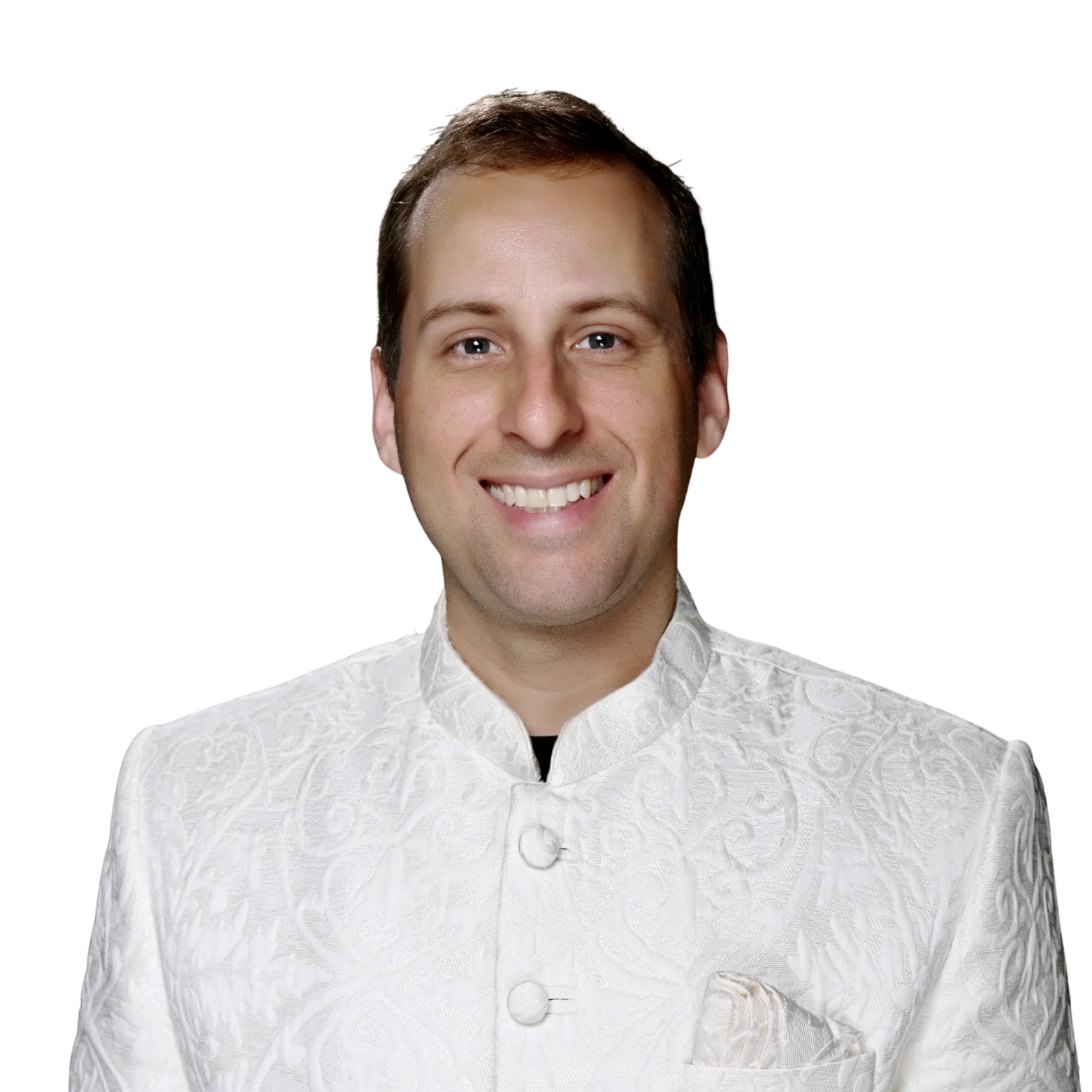 Portrait of a smiling man wearing a white embroidered traditional jacket with a stand-up collar.