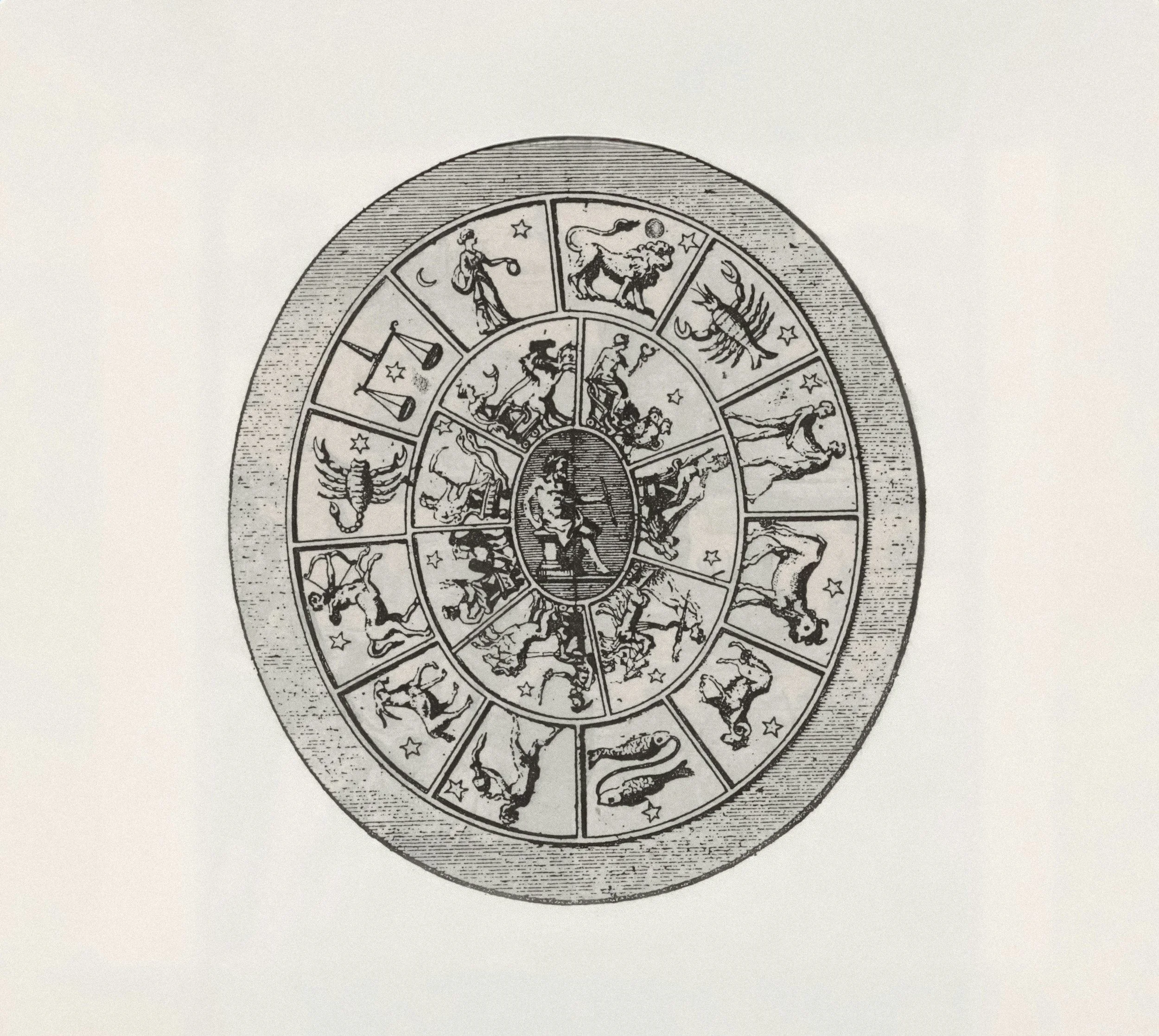 A black and white drawing of a zodiac wheel with all twelve zodiac signs arranged in a circle.