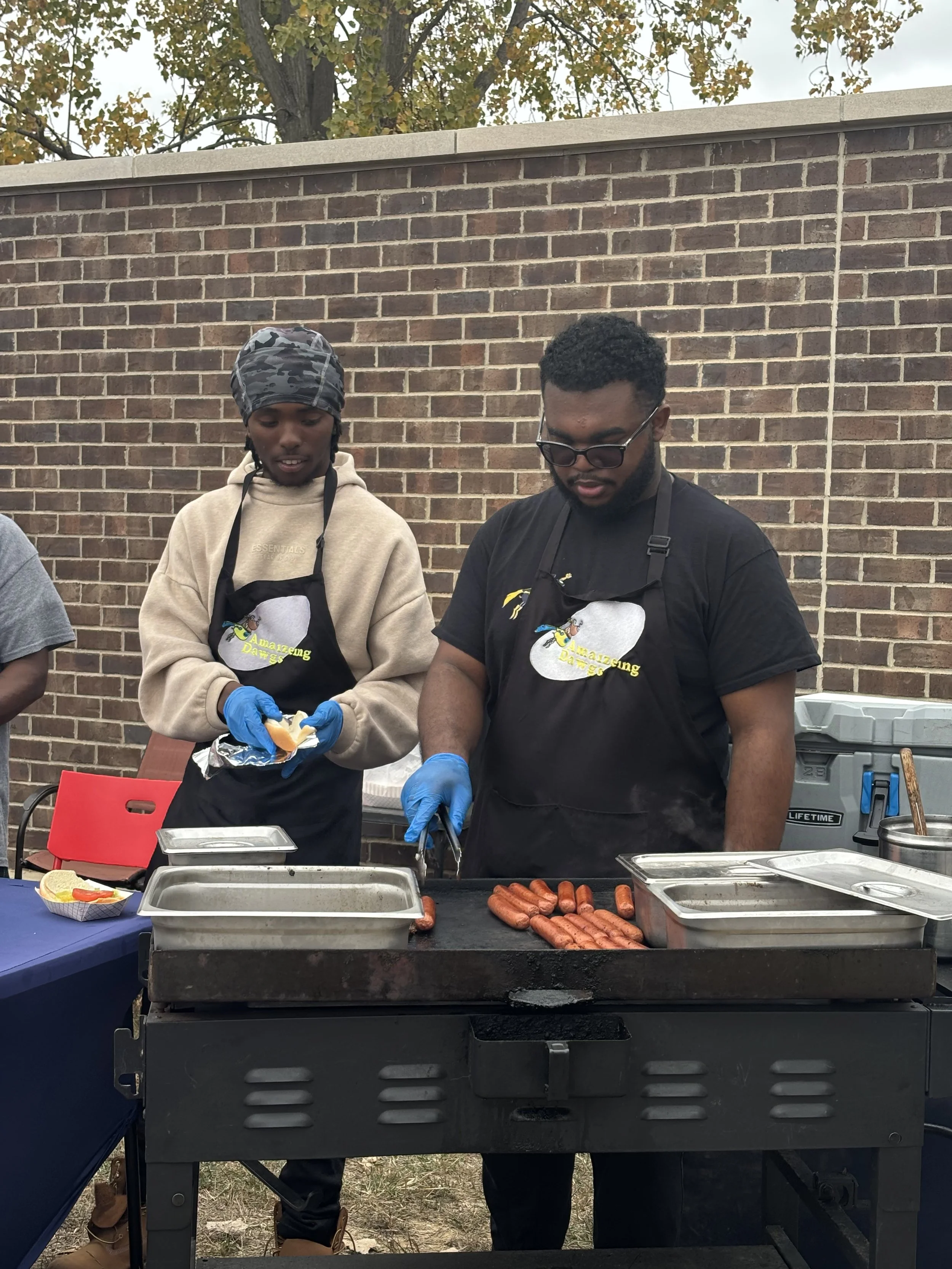 Two family staff members of Amaizeing Dawgs