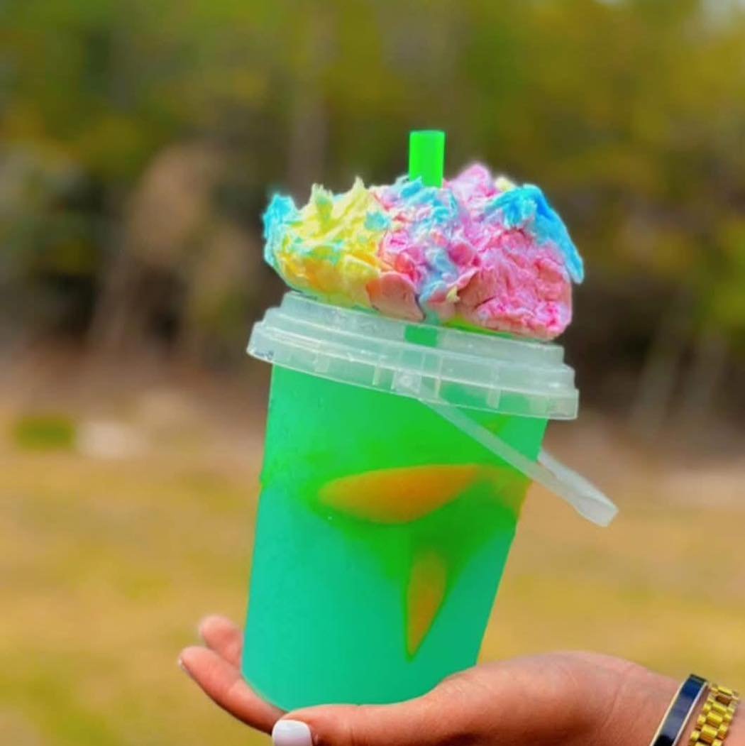 A brightly color snow cone treat from Amaizeing Dawgs