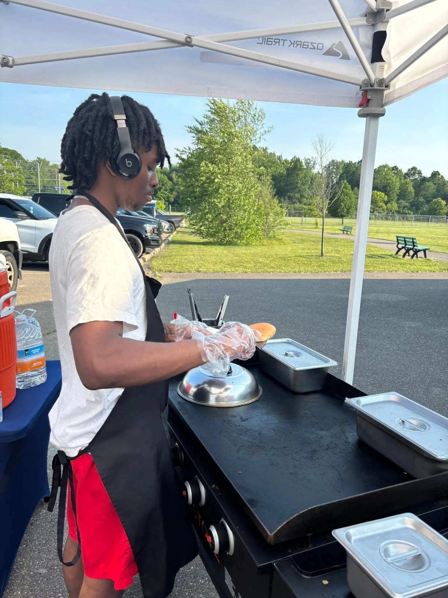 Staff working at the Amaizeing Dawgs tent.