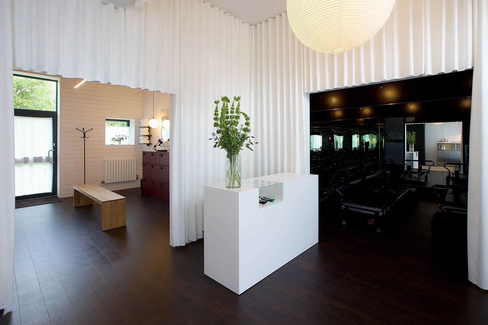 Mossa Pilates Studio Reception, reformer pilates suite and changing area